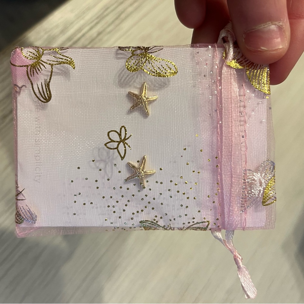 Gold starfish earrings